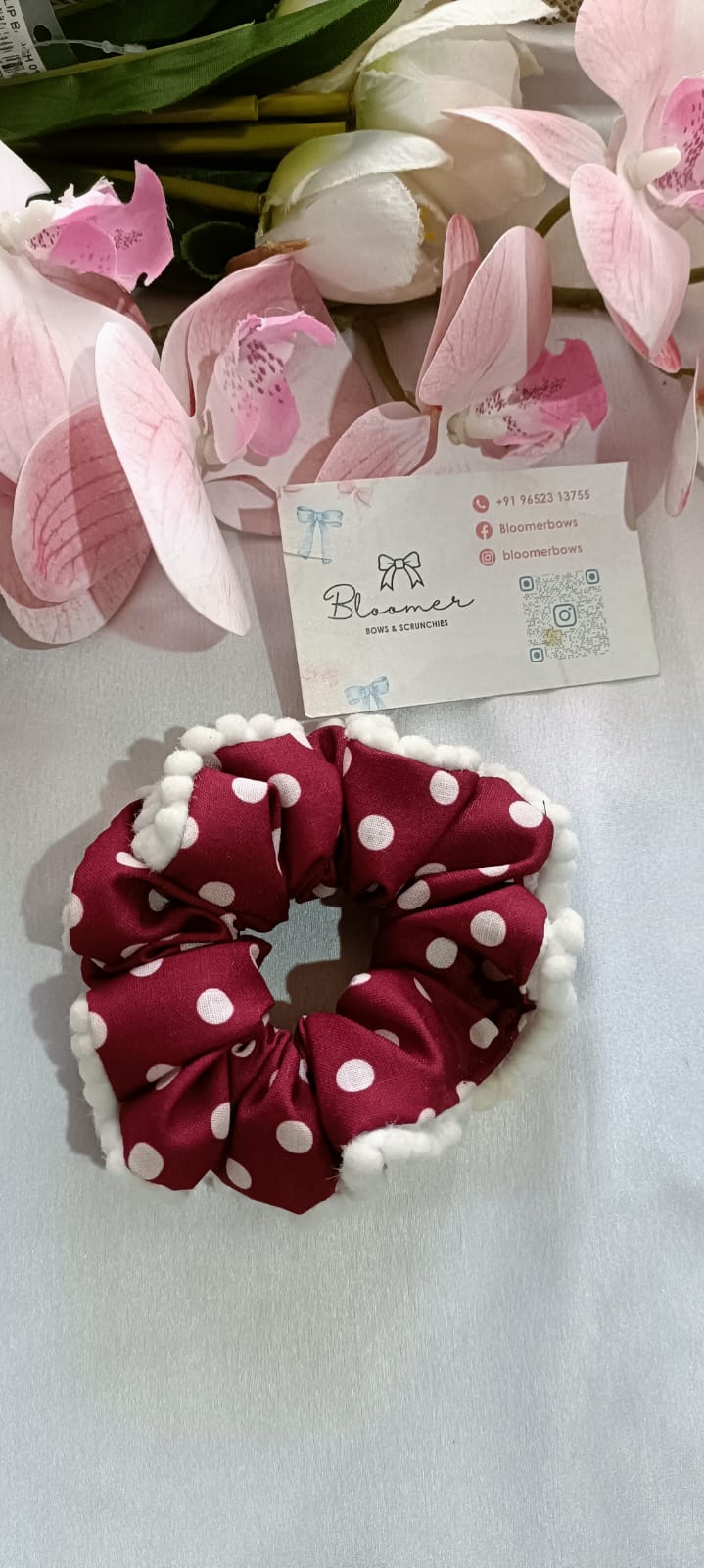 Polka dot maroon scrunchie