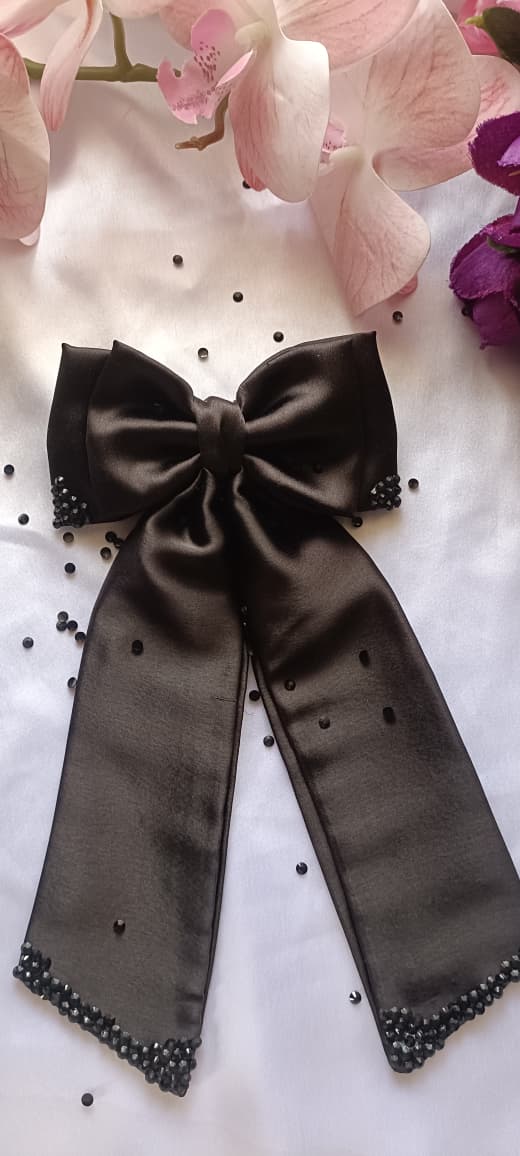 Bold black long tail bow