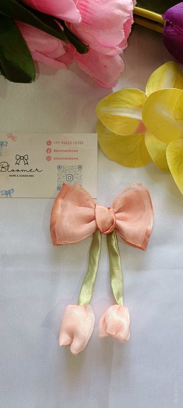 Peach tulip bow