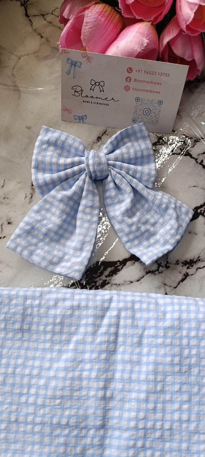 Cute baby blue gingham bow