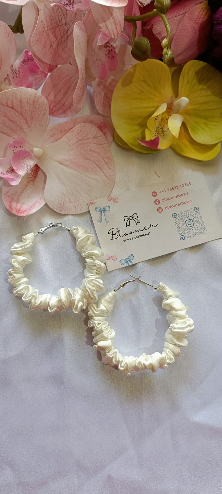 White ear hoops with pearls