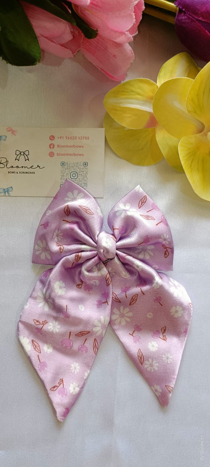 Floral lavender pigtail bow