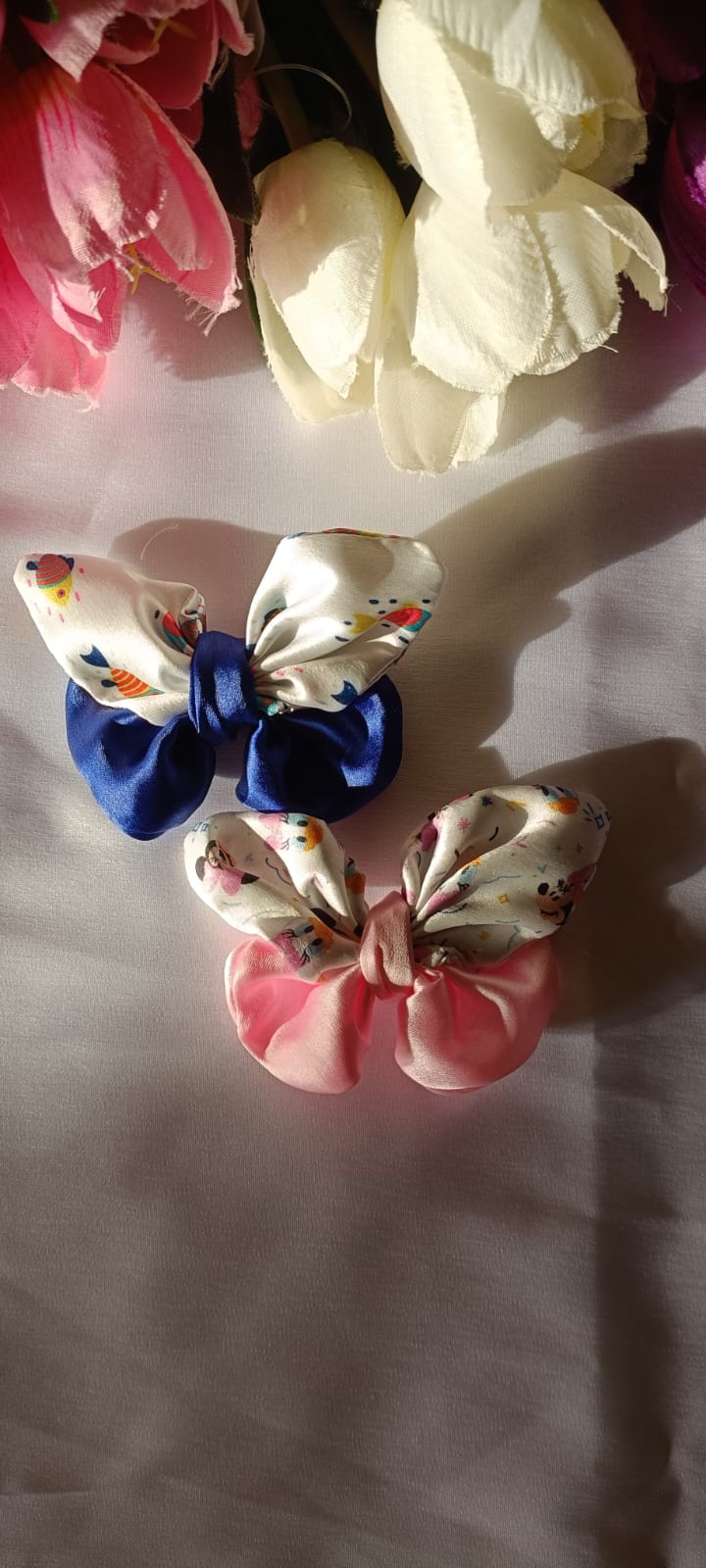 Blue and pink butterfly bows