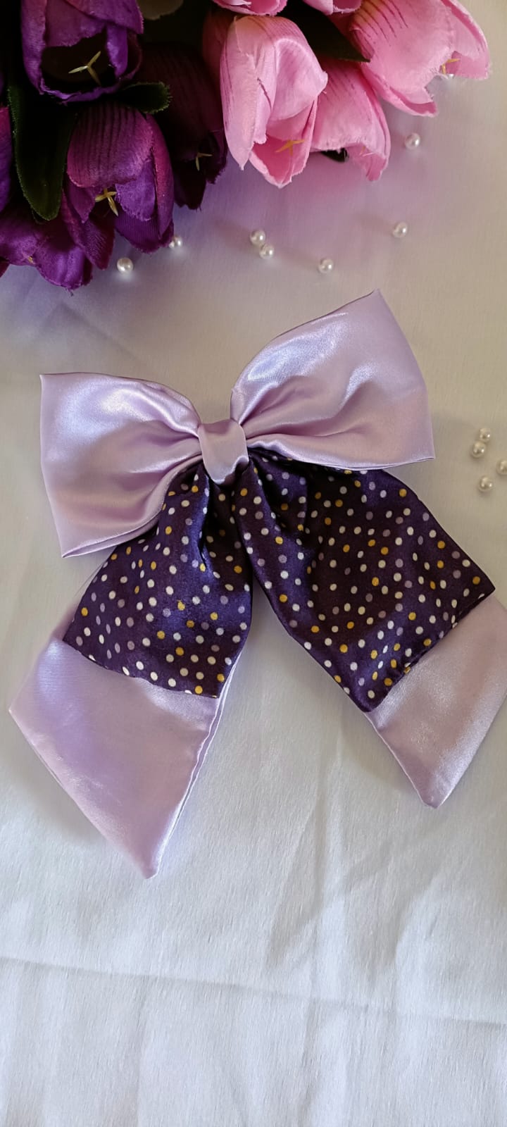 Purple double pig tail bow