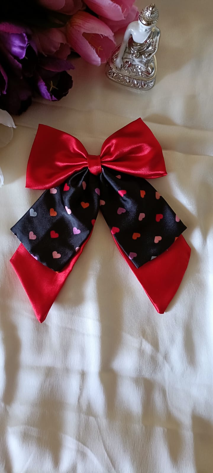 Double layer pig tail bow