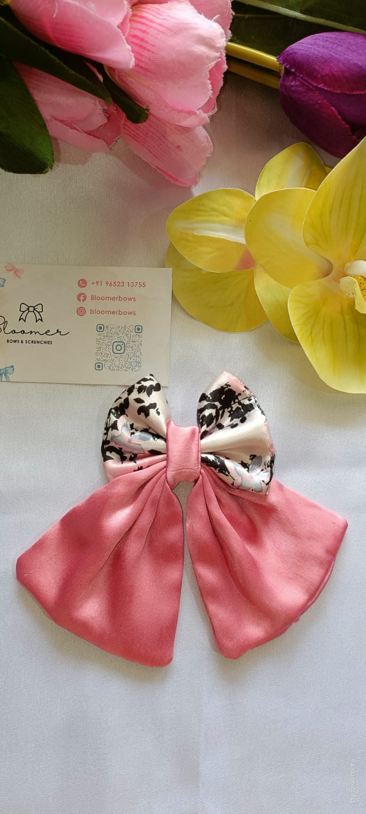 Floral pink pigtail bow